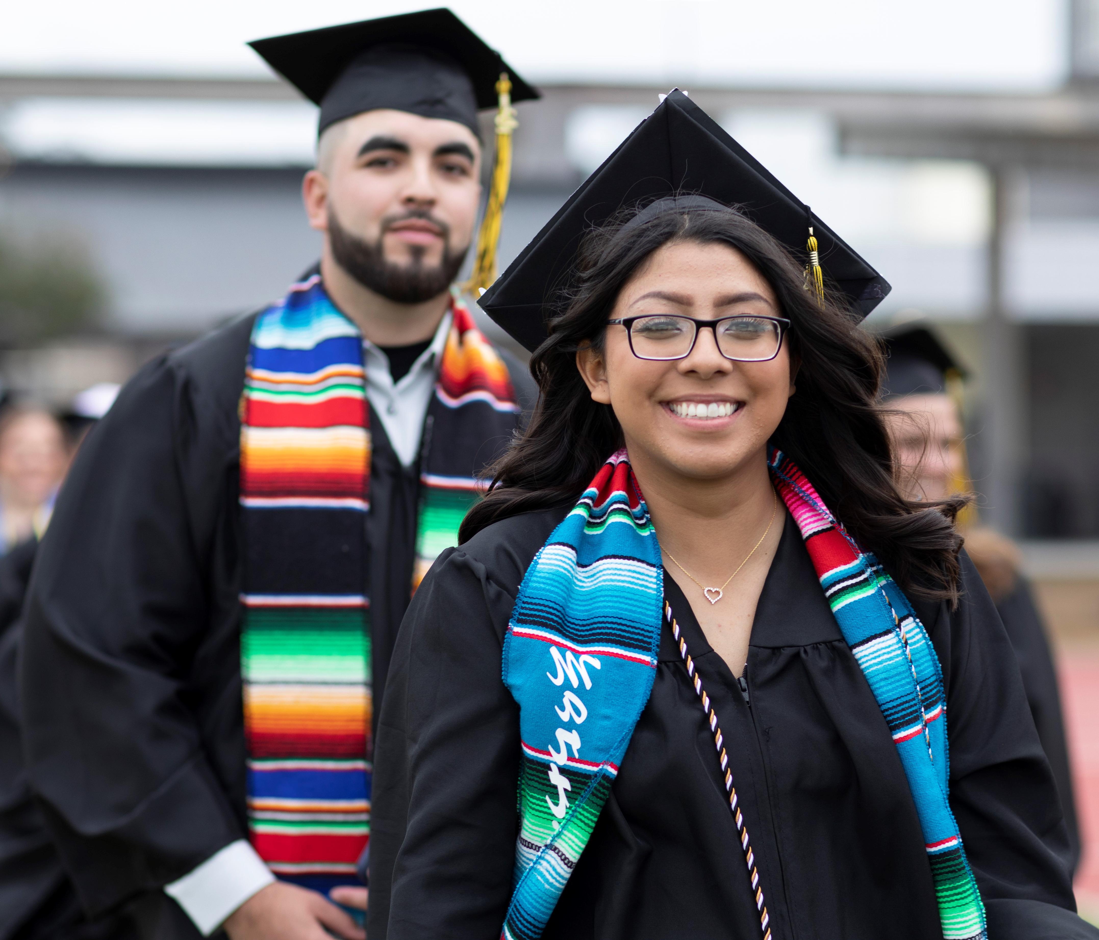 2 students at graduation